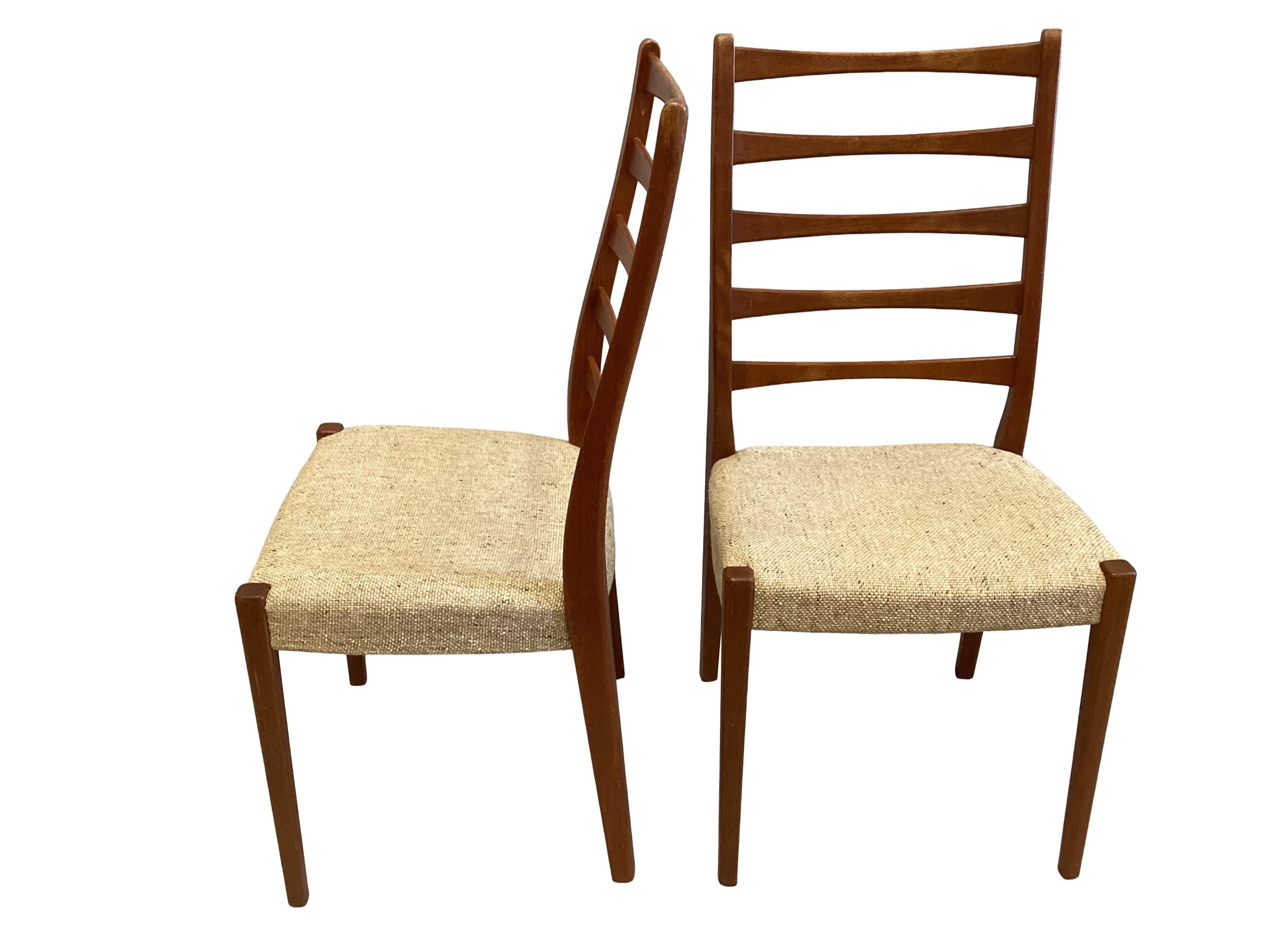 Svegards of Markaryd, a pair of mid century Swedish teak ladderback dining chairs
